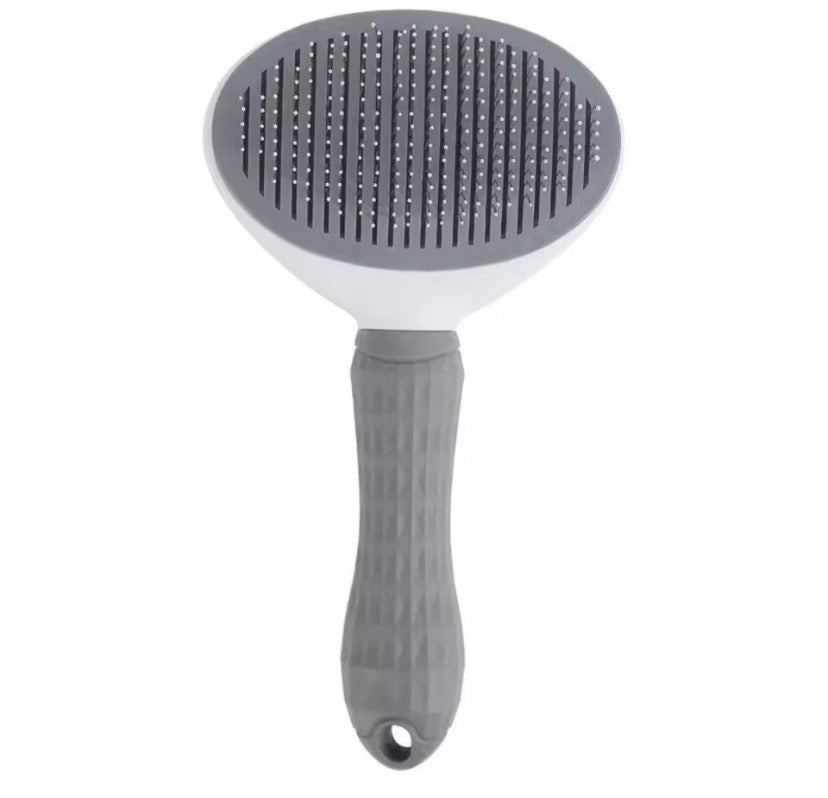 Self cleaning slicker pet brush